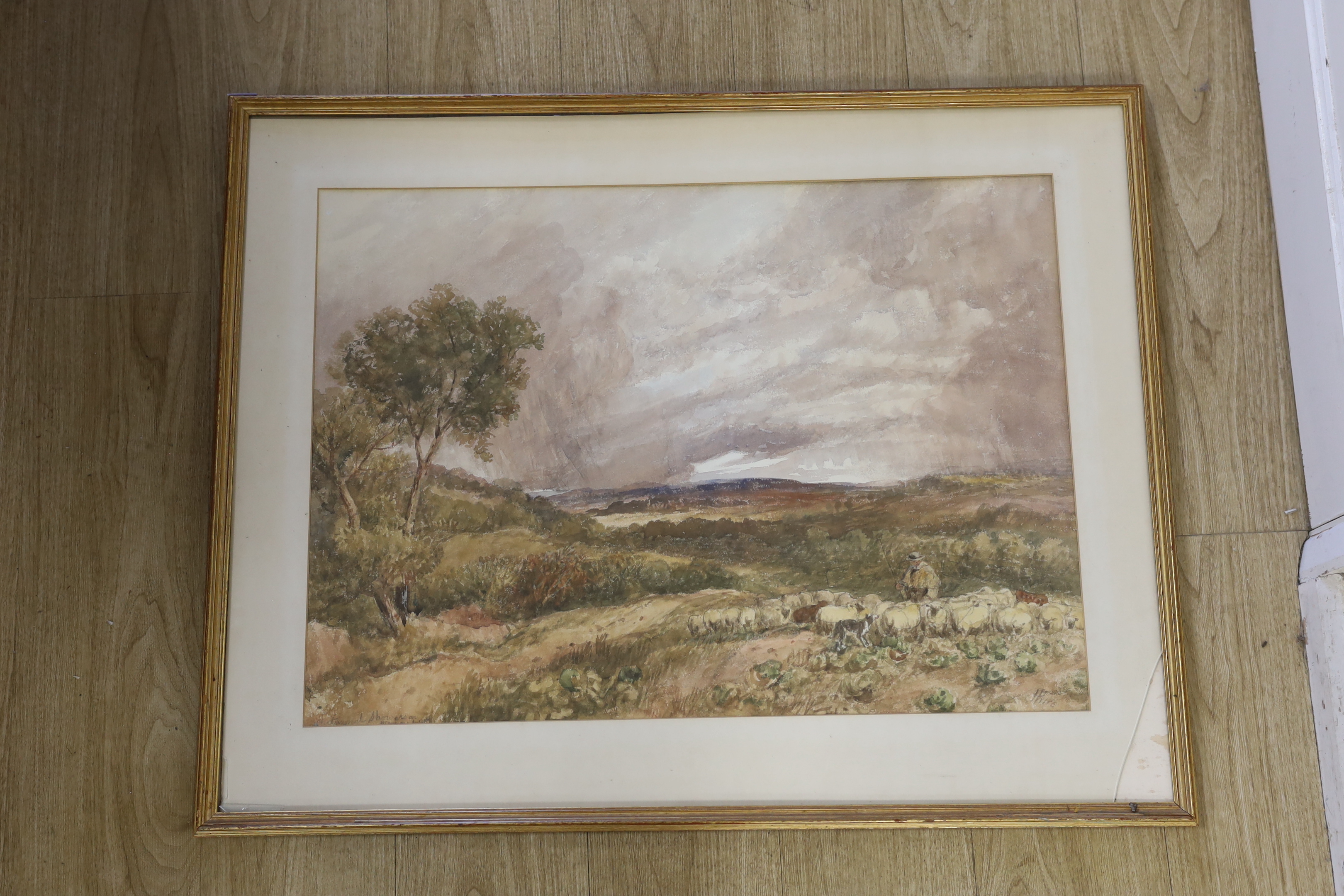 19th century English School, watercolour, Rural landscape with shepherd and flock, indistinctly signed and inscribed, 74 x 54cm